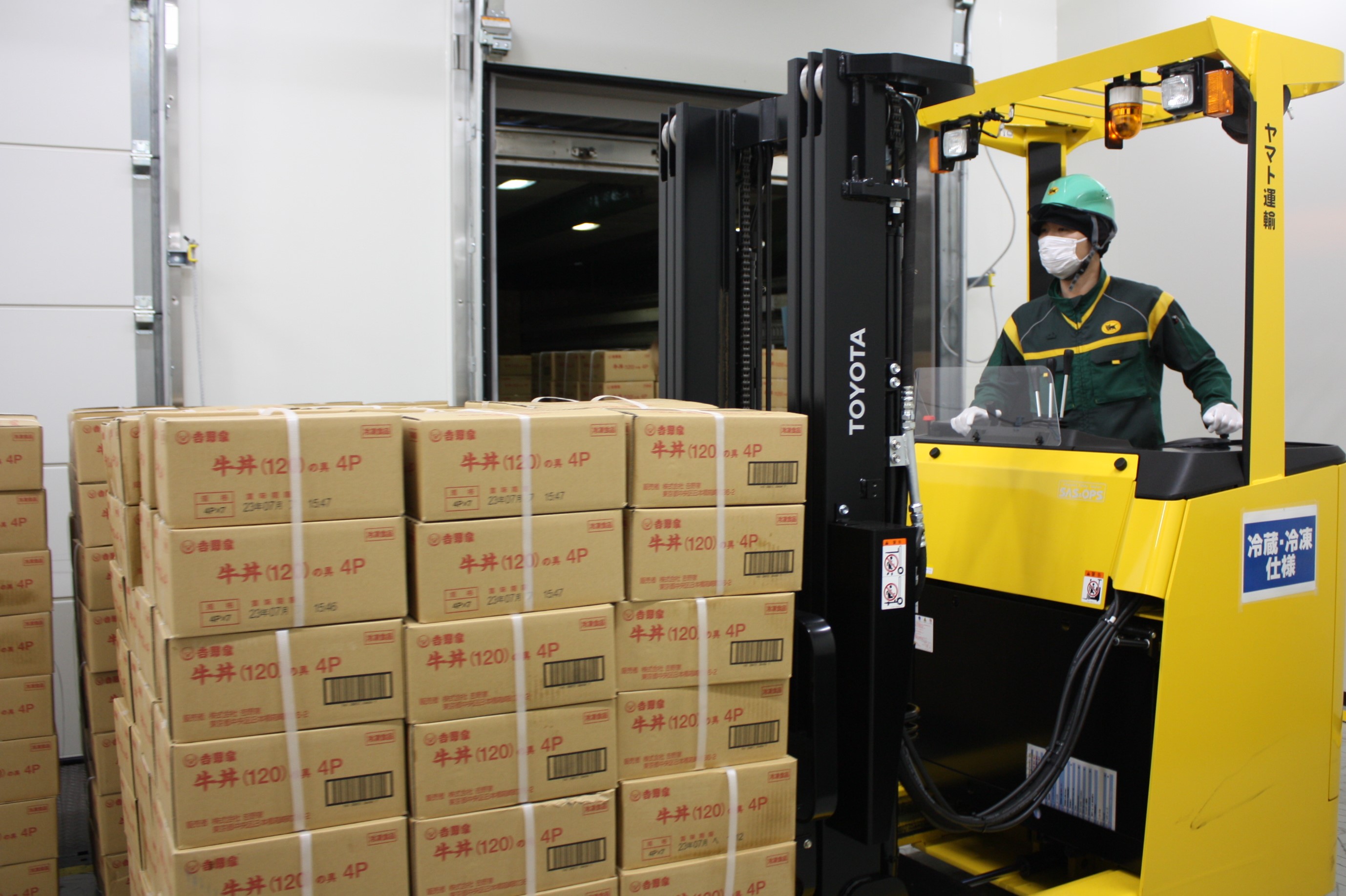Forklift moving packaged goods